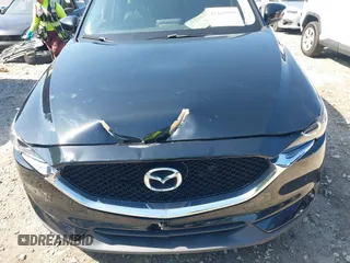 2017 Mazda CX-5 Touring z VIN JM3KFBCL0H0209458, wystawiony jako IAAI lot #42169599 z przebiegiem 93 287 mil mil oraz . Historia ofert i sprzedaży dostępna na DreamBid. Obrazek 17.