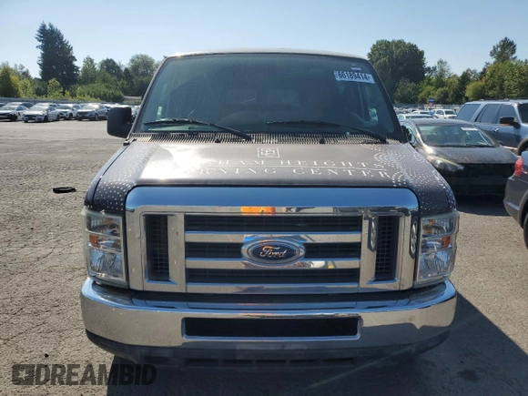 2011 Ford Econoline Passenger XL with VIN 1FBNE3BL4BDA89846, listed as a Copart auction lot 66189414 with 99,684 mi miles and Salvage Title. Bid and sale history available at carsss.com. Image 5.