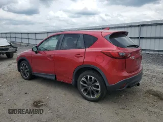 2016 Mazda CX-5 Grand Touring with VIN JM3KE4DY0G0664379, listed as a Copart auction lot 54659005 with 116,022 mi miles and Salvage Title. Bid and sale history available at DreamBid. Image 2.