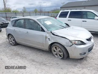 2009 Mazda Mazda3 s Touring with VIN JM1BK344991199798, listed as a IAAI auction lot 42038827 with 159,407 mi miles. Bid and sale history available at carsss.com. Image 1.