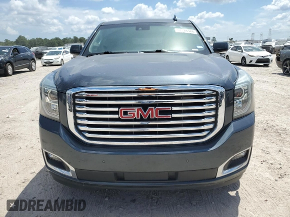 2019 GMC Yukon XL SLT with VIN 1GKS1GKCXKR404691, listed as a Copart auction lot 66746584 with Not Provided miles and Salvage Title. Bid and sale history available at carsss.com. Image 5.