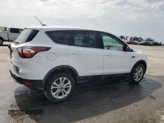 2017 Ford Escape SE z VIN 1FMCU0GD9HUE38848, wystawiony jako Copart lot #56859745 z przebiegiem 69 404 mil mil oraz Szkoda całkowita • Salvage title. Historia ofert i sprzedaży dostępna na DreamBid. Obrazek 3.