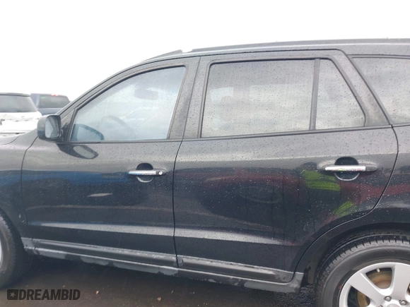 2009 Hyundai Santa Fe SE with VIN 5NMSH13E99H326553, listed as a IAAI auction lot 41740268 with 167,715 mi miles. Bid and sale history available at carsss.com. Image 14.