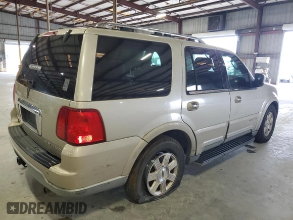 2004 Lincoln Navigator Luxury with VIN 5LMFU27R44LJ21559, listed as a Copart auction lot 74971914 with 179,213 mi miles and Salvage Title. Bid and sale history available at carsss.com. Image 3.