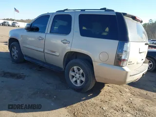 2007 GMC Yukon SLT with VIN 1GKFK13067J382064, listed as a IAAI auction lot 41371965 with 260,205 mi miles. Bid and sale history available at carsss.com. Image 3.