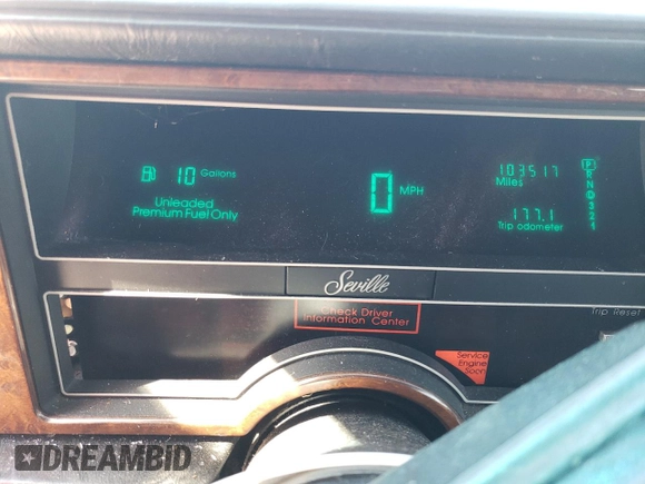 1991 Cadillac Seville z VIN 1G6KS53B9MU824142, wystawiony jako Copart lot #74276264 z przebiegiem 103 517 mil mil oraz Szkody całkowita. Historia ofert i sprzedaży dostępna na DreamBid. Obrazek 9.