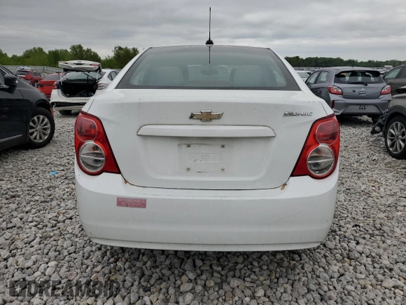2015 Chevrolet Sonic LS with VIN 1G1JA5SH4F4165108, listed as a Copart auction lot 57299985 with 117,669 mi miles and Clean title. Bid and sale history available at DreamBid. Image 6.