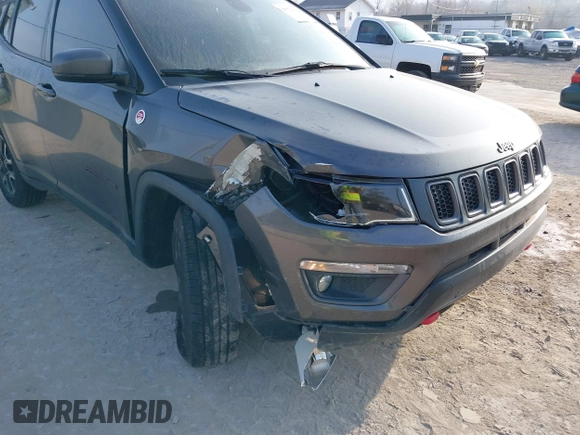 2019 Jeep Compass Trailhawk with VIN 3C4NJDDB9KT622415, listed as a IAAI auction lot 41779314 with 98,930 mi miles and . Bid and sale history available at carsss.com. Image 6.