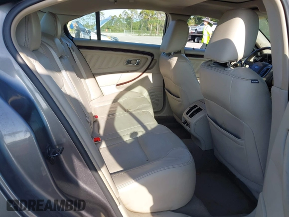 2011 Ford Taurus Limited with VIN 1FAHP2FW3BG117688, listed as a IAAI auction lot 41974469 with 215,036 mi miles and . Bid and sale history available at carsss.com. Image 8.