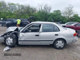2001 Chevrolet Prizm z VIN 1Y1SK52851Z423703, wystawiony jako IAAI lot #42169702 z przebiegiem Nie podano mil oraz . Historia ofert i sprzedaży dostępna na DreamBid. Obrazek 15.