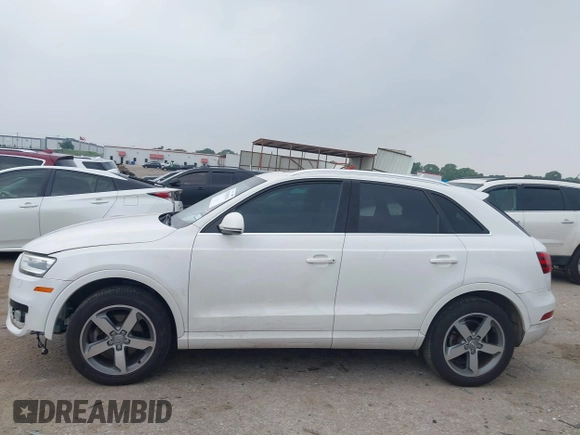 2015 Audi Q3 Premium Plus with VIN WA1EFCFS2FR008193, listed as a IAAI auction lot 42301074 with 102,878 mi miles and . Bid and sale history available at DreamBid. Image 14.
