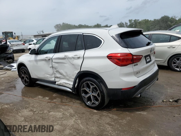 2019 BMW X1 sDrive28i with VIN WBXHU7C57K5L10243, listed as a Copart auction lot 48959423 with 42,248 mi miles and . Bid and sale history available at DreamBid. Image 2.