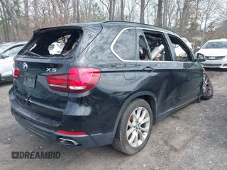 2016 BMW X5 xDrive40e with VIN 5UXKT0C55G0S75539, listed as a IAAI auction lot 41683390 with Not Provided miles and . Bid and sale history available at DreamBid. Image 4.