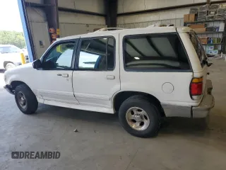 1996 Ford Explorer XL with VIN 1FMDU32X6TUD64045, listed as a Copart auction lot 65942264 with 138,750 mi miles and Salvage title. Bid and sale history available at DreamBid. Image 2.