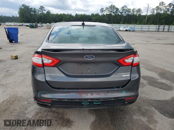 2016 Ford Fusion Titanium with VIN 3FA6P0K90GR180288, listed as a Copart auction lot 60218155 with 140,502 mi miles and Salvage title. Bid and sale history available at DreamBid. Image 6.