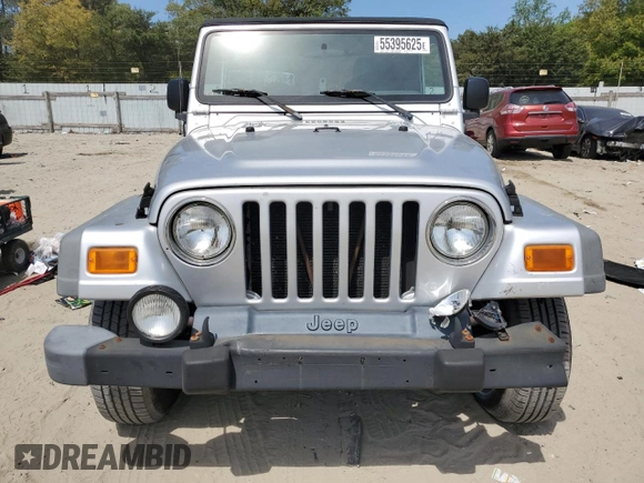 2004 Jeep Wrangler Sport with VIN 1J4FA49S44P788467, listed as a Copart auction lot 55395625 with 187,289 mi miles and Salvage title. Bid and sale history available at DreamBid. Image 5.