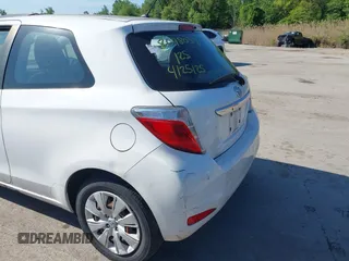 2014 Toyota Yaris L with VIN VNKJTUD35EA011933, listed as a IAAI auction lot 42150303 with 114,369 mi miles. Bid and sale history available at carsss.com. Image 13.