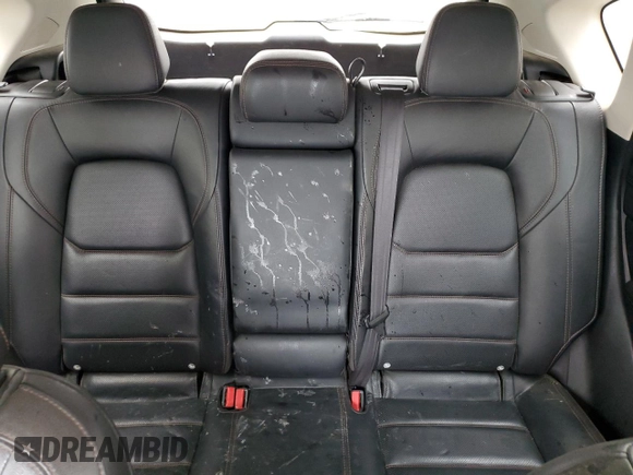 2021 Mazda CX-5 Grand Touring z VIN JM3KFADM7M1339081, wystawiony jako Copart lot #58913585 z przebiegiem Nie podano mil oraz Szkoda całkowita • Salvage title. Historia ofert i sprzedaży dostępna na DreamBid. Obrazek 10.