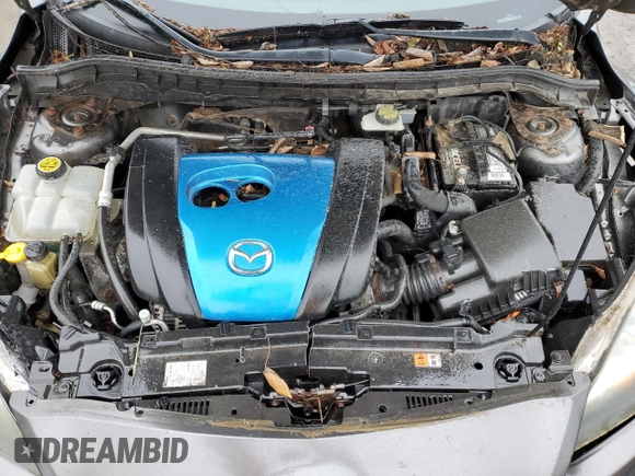 2012 Mazda 3 i Touring z VIN JM1BL1L82C1684247, wystawiony jako Copart lot #56695975 z przebiegiem 229 778 mil mil oraz Szkoda całkowita • Salvage title. Historia ofert i sprzedaży dostępna na DreamBid. Obrazek 11.
