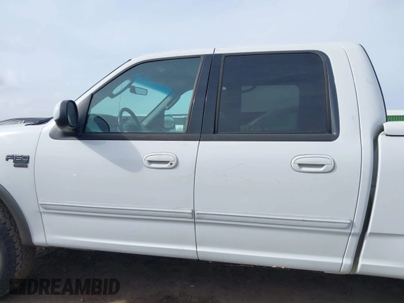 2003 Ford F-150 XLT with VIN 1FTRW08L73KA73945, listed as a IAAI auction lot 41474904 with 122,080 mi miles. Bid and sale history available at carsss.com. Image 15.