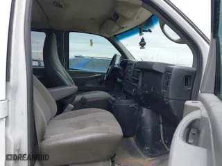 2014 Chevrolet Express Passenger LT with VIN 1GAZG1FG6E1119310, listed as a IAAI auction lot 41913430 with 130,442 mi miles. Bid and sale history available at carsss.com. Image 5.