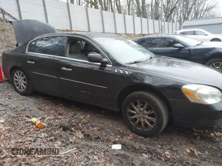 2009 Buick Lucerne CXL with VIN 1G4HD57M19U101398, listed as a IAAI auction lot 41937119 with 236,257 mi miles and . Bid and sale history available at DreamBid. Image 14.