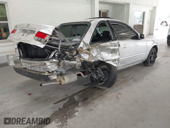 2000 Honda Civic EX with VIN 1HGEJ8244YL015940, listed as a IAAI auction lot 42427040 with 217,792 mi miles and . Bid and sale history available at DreamBid. Image 4.