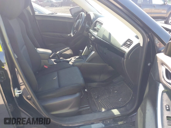 2014 Mazda CX-5 Sport z VIN JM3KE2BE2E0325715, wystawiony jako IAAI lot #42683243 z przebiegiem 262 005 mil mil oraz . Historia ofert i sprzedaży dostępna na DreamBid. Obrazek 5.