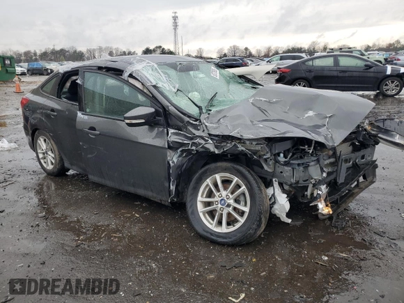 2016 Ford Focus SE with VIN 1FADP3F26GL354210, listed as a Copart auction lot 50378885 with 9,617 mi miles and Salvage Title. Bid and sale history available at DreamBid. Image 4.