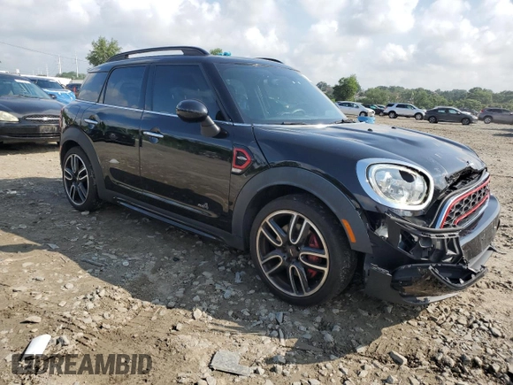 2019 MINI Countryman John Cooper Works with VIN WMZYV9C5XK3F02695, listed as a Copart auction lot 63736285 with 82,706 mi miles and Salvage title. Bid and sale history available at DreamBid. Image 4.