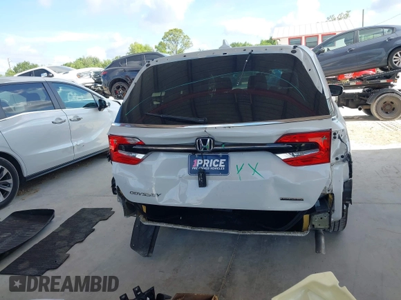 2021 Honda Odyssey Touring z VIN 5FNRL6H80MB003323, wystawiony jako IAAI lot #42303968 z przebiegiem 51 531 mil mil oraz . Historia ofert i sprzedaży dostępna na DreamBid. Obrazek 17.