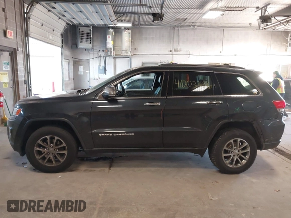 2015 Jeep Grand Cherokee Limited with VIN 1C4RJFBG5FC941811, listed as a IAAI auction lot 41003336 with 137,867 mi miles. Bid and sale history available at carsss.com. Image 14.