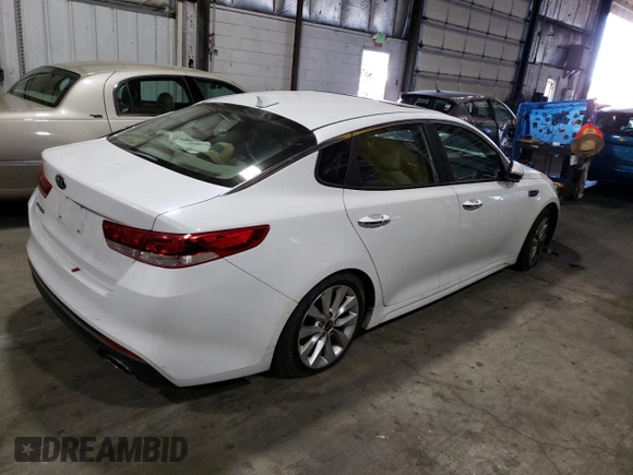 2016 Kia Optima LX with VIN 5XXGT4L30GG002858, listed as a Copart auction lot 74230034 with 83,651 mi miles and Salvage title. Bid and sale history available at DreamBid. Image 3.