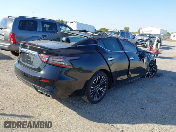 2019 Nissan Maxima Platinum z VIN 1N4AA6AV3KC378092, wystawiony jako IAAI lot #40527428 z przebiegiem 108 643 mil mil oraz . Historia ofert i sprzedaży dostępna na DreamBid. Obrazek 4.