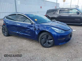 2019 Tesla Model 3 Mid Range z VIN 5YJ3E1EA8KF308947, wystawiony jako IAAI lot #39617997 z przebiegiem 70 831 mil mil oraz . Historia ofert i sprzedaży dostępna na DreamBid. Obrazek 1.