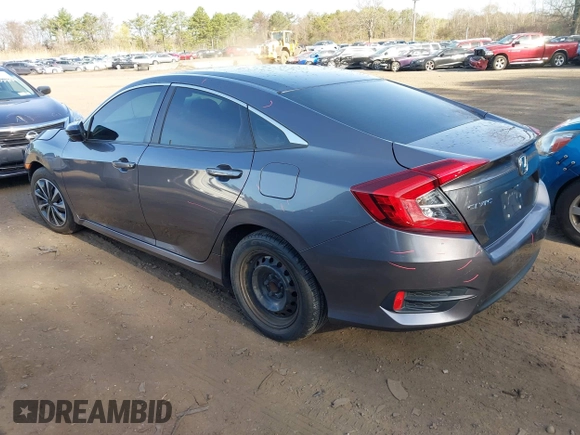 2017 Honda Civic Sedan LX with VIN 19XFC2F56HE233741, listed as a IAAI auction lot 42022068 with 65,587 mi miles. Bid and sale history available at carsss.com. Image 3.