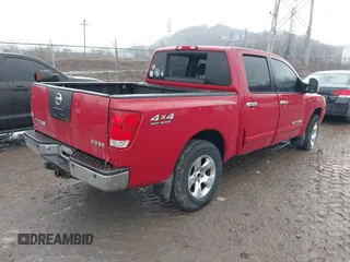 2005 Nissan Titan SE with VIN 1N6BA07B75N537467, listed as a IAAI auction lot 41540903 with 238,607 mi miles and . Bid and sale history available at DreamBid. Image 4.