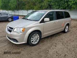 2015 Dodge Grand Caravan SXT with VIN 2C4RDGCG7FR536049, listed as a Copart auction lot 55963115 with 141,228 mi miles and Clean Title. Bid and sale history available at DreamBid. Image 1.