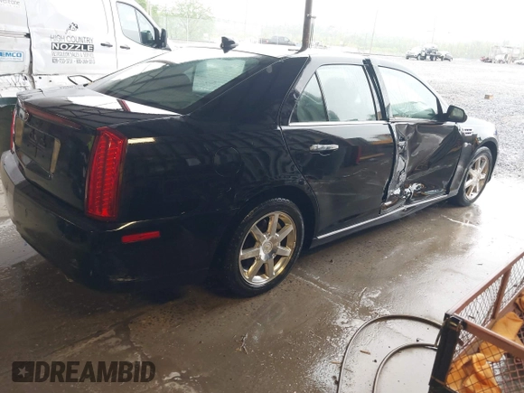 2011 Cadillac STS RWD w/1SB with VIN 1G6DW6ED1B0121186, listed as a IAAI auction lot 42094324 with 101,886 mi miles. Bid and sale history available at carsss.com. Image 4.