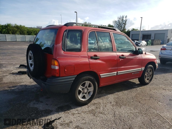 2003 Chevrolet Tracker with VIN 2CNBE13CX36943395, listed as a Copart auction lot 70964574 with 118,975 mi miles and Salvage title. Bid and sale history available at DreamBid. Image 3.