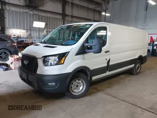 2021 Ford Transit Cargo with VIN 1FTBR1Y87MKA76372, listed as a IAAI auction lot 42251675 with 98,072 mi miles and . Bid and sale history available at DreamBid. Image 2.