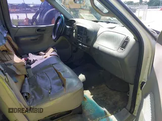 1999 Ford F-150 with VIN 1FTRX17W6XNB60822, listed as a IAAI auction lot 42310975 with Not provided miles and . Bid and sale history available at DreamBid. Image 5.