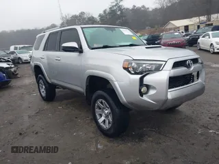 2014 Toyota 4Runner Limited with VIN JTEBU5JR5E5198734, listed as a IAAI auction lot 41513562 with 322,459 mi miles. Bid and sale history available at carsss.com. Image 1.