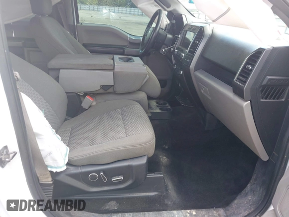 2018 Ford F-150 XL with VIN 1FTEW1E50JKC91068, listed as a IAAI auction lot 42221345 with 135,095 mi miles and . Bid and sale history available at DreamBid. Image 5.
