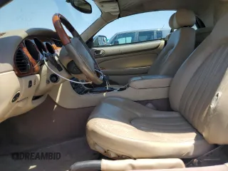 2002 Jaguar XK with VIN SAJDA42C62NA25816, listed as a Copart auction lot 52802525 with Not Provided miles and Salvage Title. Bid and sale history available at DreamBid. Image 7.