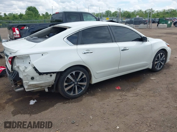 2016 Nissan Altima S z VIN 1N4AL3AP0GC174433, wystawiony jako IAAI lot #42257840 z przebiegiem 122 158 mil mil oraz . Historia ofert i sprzedaży dostępna na DreamBid. Obrazek 4.
