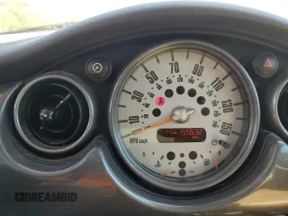 2005 MINI Hardtop S with VIN WMWRE33475TD92831, listed as a Copart auction lot 55299615 with 155,632 mi miles and Salvage title. Bid and sale history available at DreamBid. Image 9.