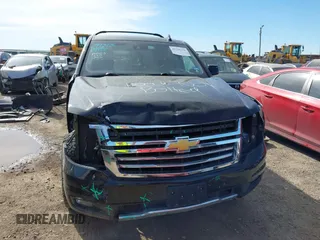 2016 Chevrolet Suburban LT with VIN 1GNSKHKC4GR275389, listed as a IAAI auction lot 41796216 with 144,776 mi miles and . Bid and sale history available at DreamBid. Image 13.