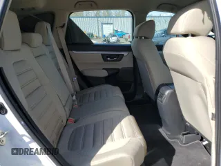 2019 Honda CR-V LX z VIN 5J6RW6H35KL004807, wystawiony jako Copart lot #51943275 z przebiegiem 119 862 mil mil oraz Szkoda całkowita • Salvage title. Historia ofert i sprzedaży dostępna na DreamBid. Obrazek 11.