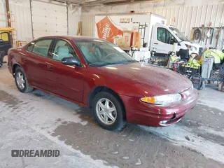 2002 Oldsmobile Alero GL1 z VIN 1G3NL52E32C231575, wystawiony jako IAAI lot #42250333 z przebiegiem 43 370 mil mil oraz . Historia ofert i sprzedaży dostępna na DreamBid. Obrazek 1.